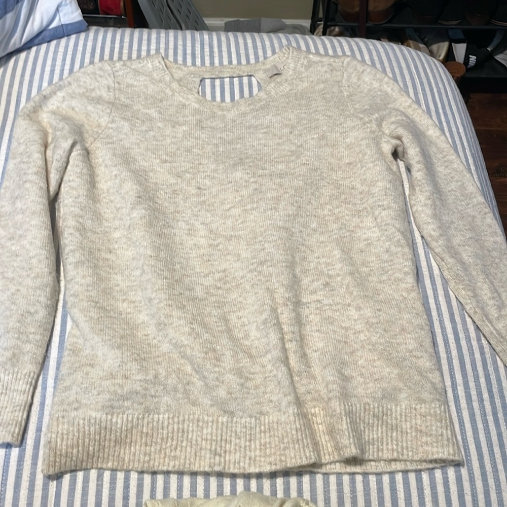 Cream color Loft petite medium long sleeves light weight sweater.